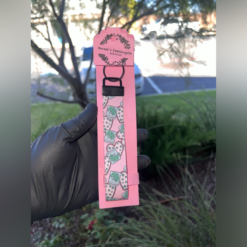 Black key fobe wristlet Keychain with glitter light pink on the inside